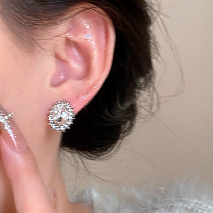 Pigeon egg zircon earrings high-grade sense